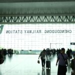 Tourists walking at an airport to show international tourist arrival