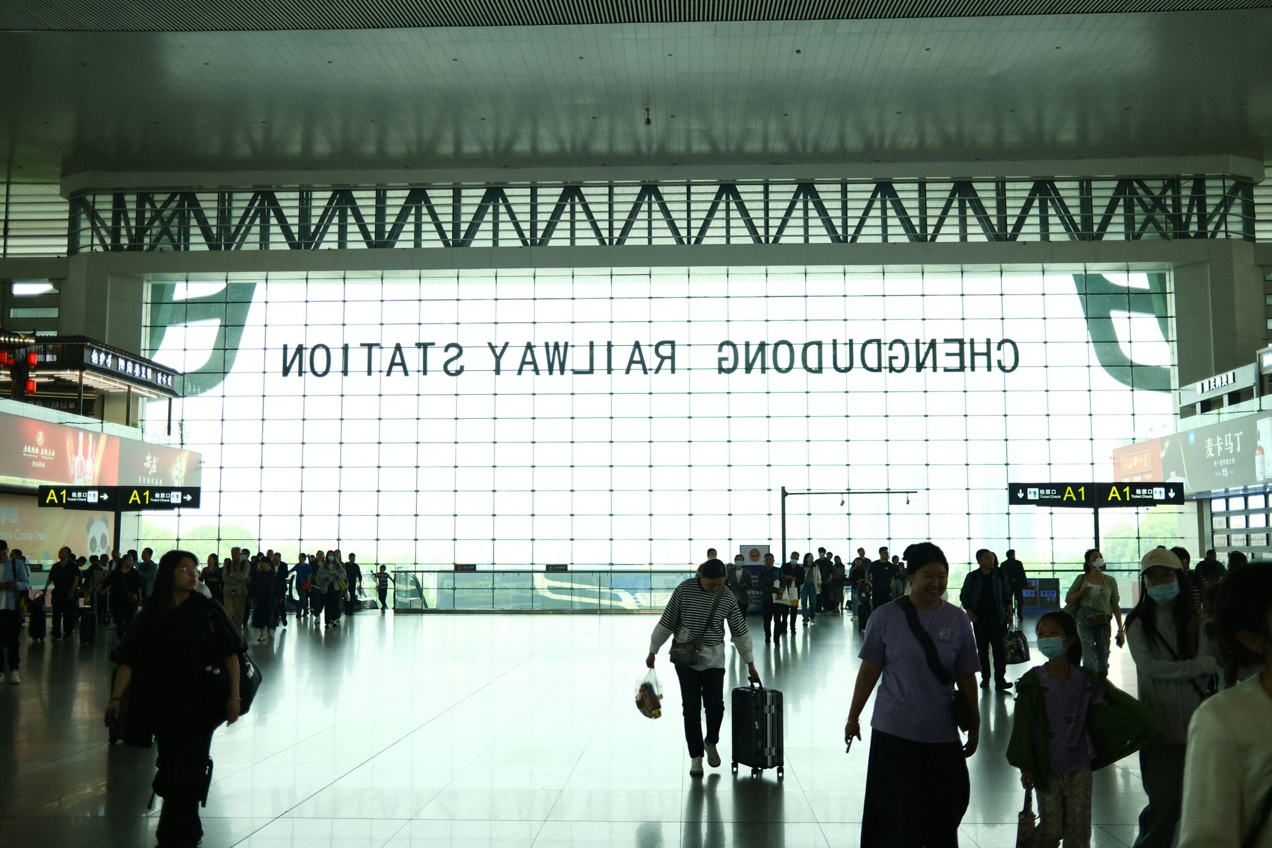 Tourists walking at an airport to show international tourist arrival