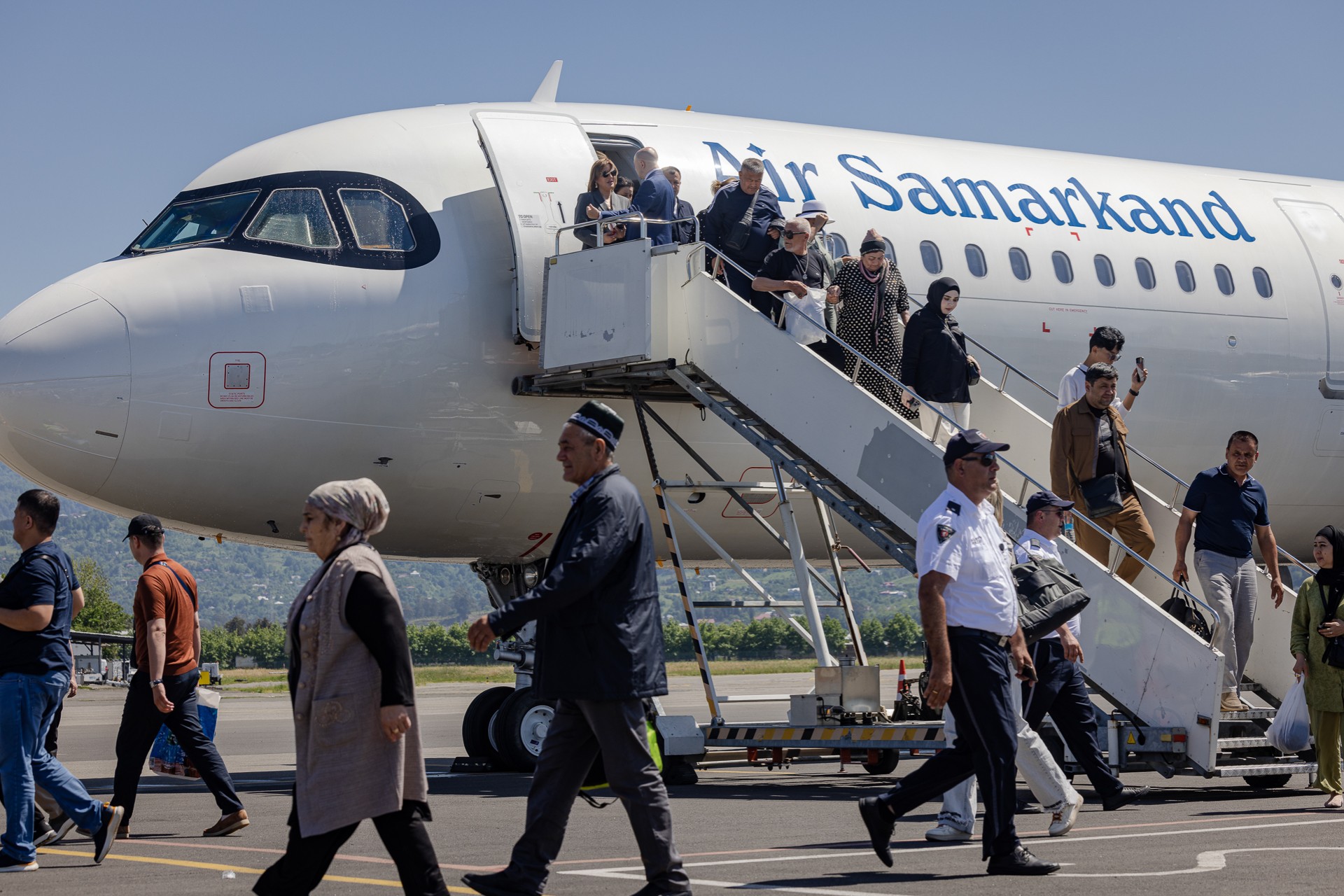 Passenger alighting the Air Samarkand