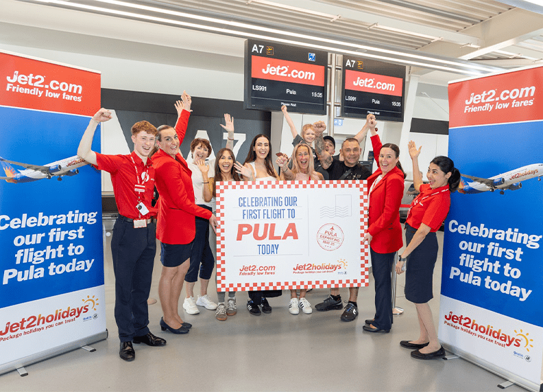 Jet2 staff celebrate their first flight to Pula with a giant postcard.