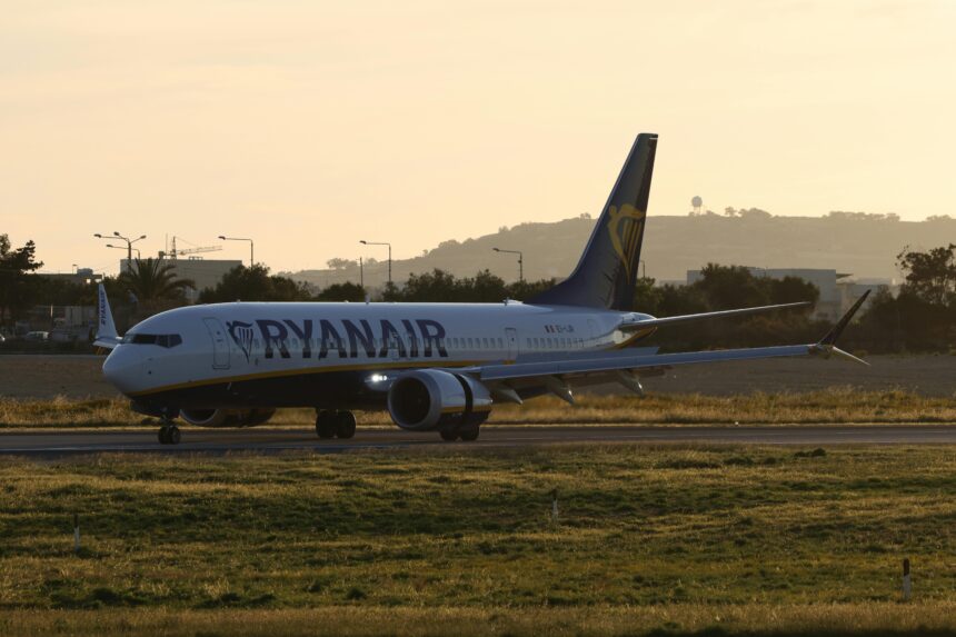 Ryanair aircraft on runway.