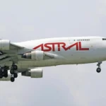 A photo of an Astral Aviation Cargo Airplane Flying