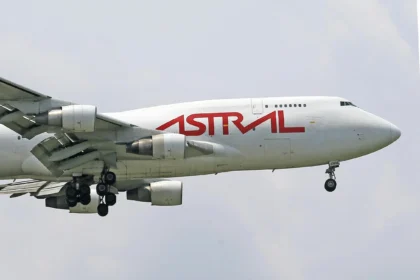 A photo of an Astral Aviation Cargo Airplane Flying