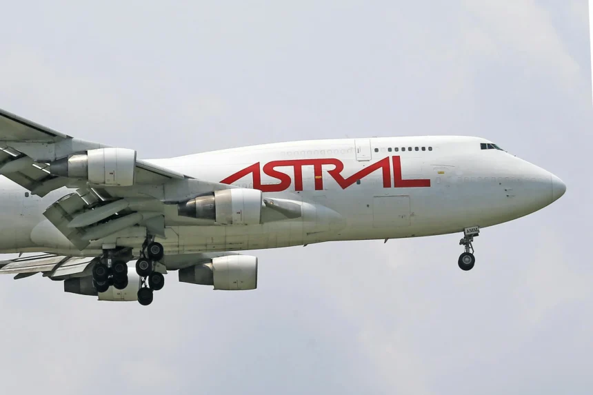 A photo of an Astral Aviation Cargo Airplane Flying