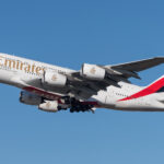 An Emirates Airbus A380-861 in the air.