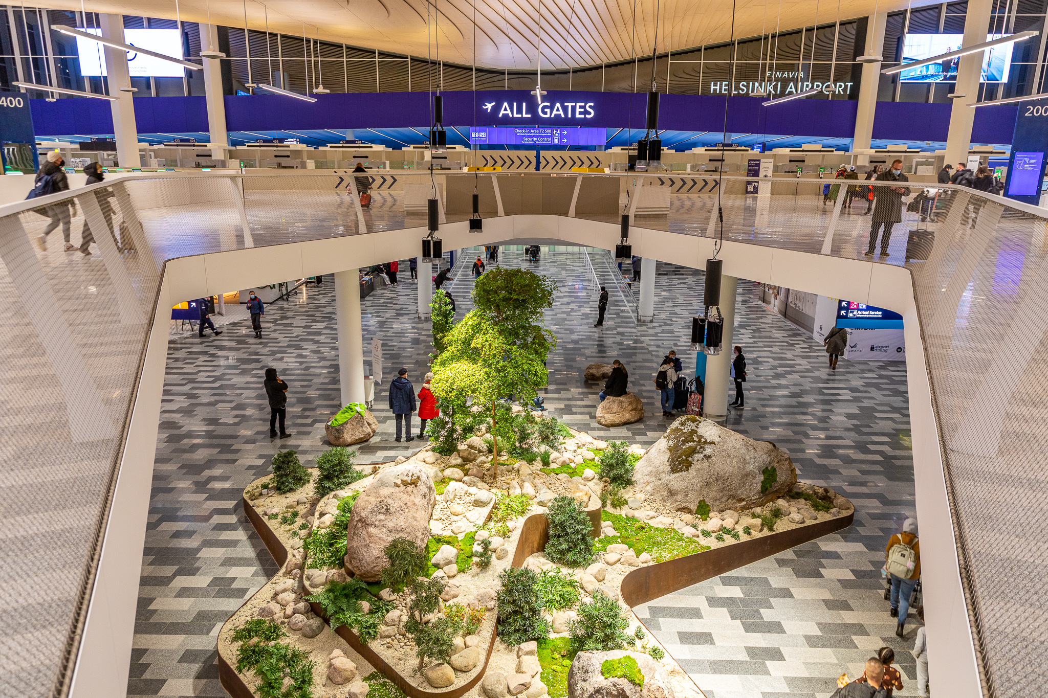 An image of the departure hall at Helsinki Airport.