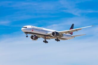 An Air Canada aeroplane mid flight.