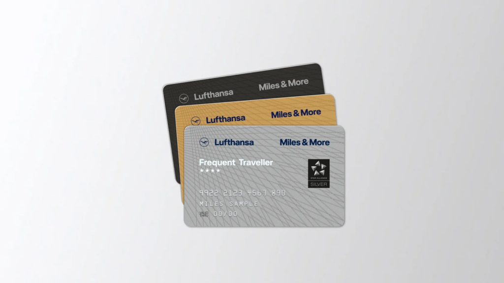 A set of Miles & More Service Cards with different colour, including sliver, gold, and black, featuring the Lufthansa Group logo.