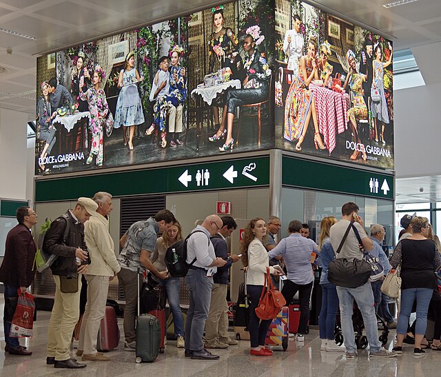 Long passenger queue at the Milan Airport 