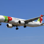 An image of a TAP Air A321neo in the air.
