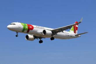 An image of a TAP Air A321neo in the air.
