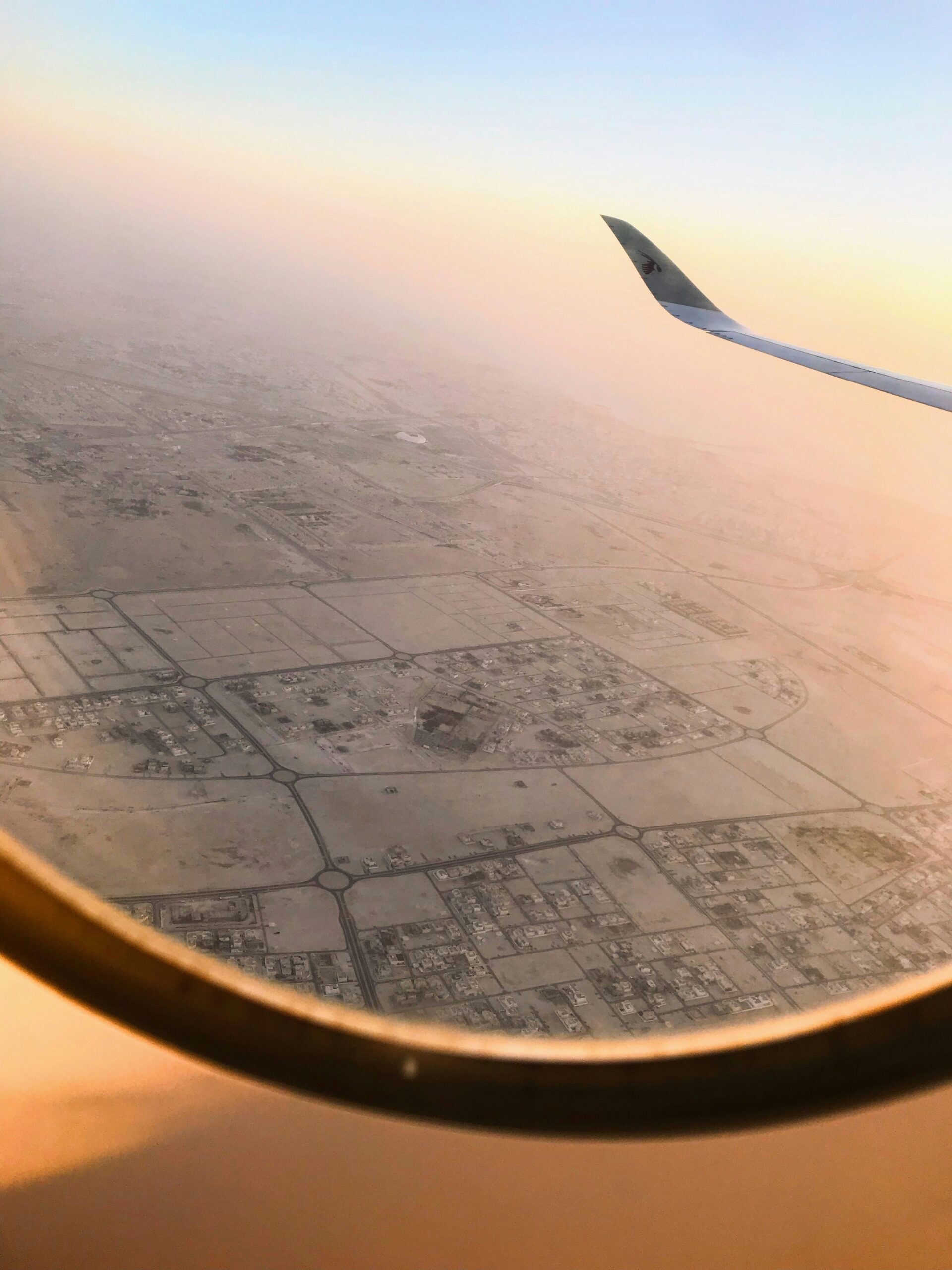 Window view of Doha, Qatar from Qatar Airways aircraft