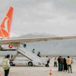 Passengers on a Turkish Airlines flight. Turkish authorities to impose passenger fines for disruptive passengers who get up before the plane lands