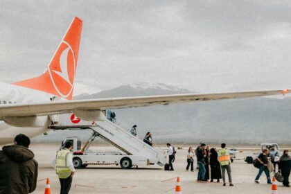 Passengers on a Turkish Airlines flight. Turkish authorities to impose passenger fines for disruptive passengers who get up before the plane lands