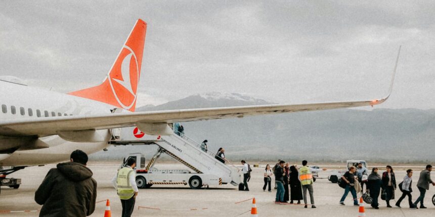 Passengers on a Turkish Airlines flight. Turkish authorities to impose passenger fines for disruptive passengers who get up before the plane lands