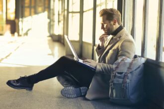 Brown Haired Man Using Laptop Computer