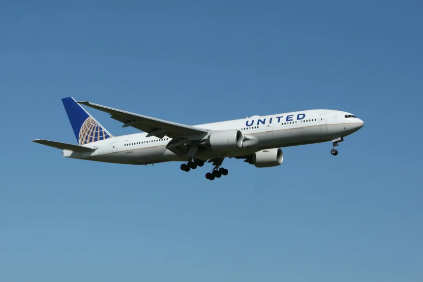 A photo of a United Airlines Airplane mid-flight