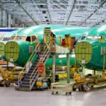 Boeing 737 fuselage sections sit on the assembly floor at Spirit AeroSystems in Wichita, Kan. Boeing, Airbus and Spirit reached a deal to break up the troubled supplier and split the business.