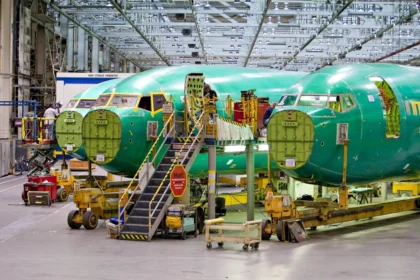 Boeing 737 fuselage sections sit on the assembly floor at Spirit AeroSystems in Wichita, Kan. Boeing, Airbus and Spirit reached a deal to break up the troubled supplier and split the business.