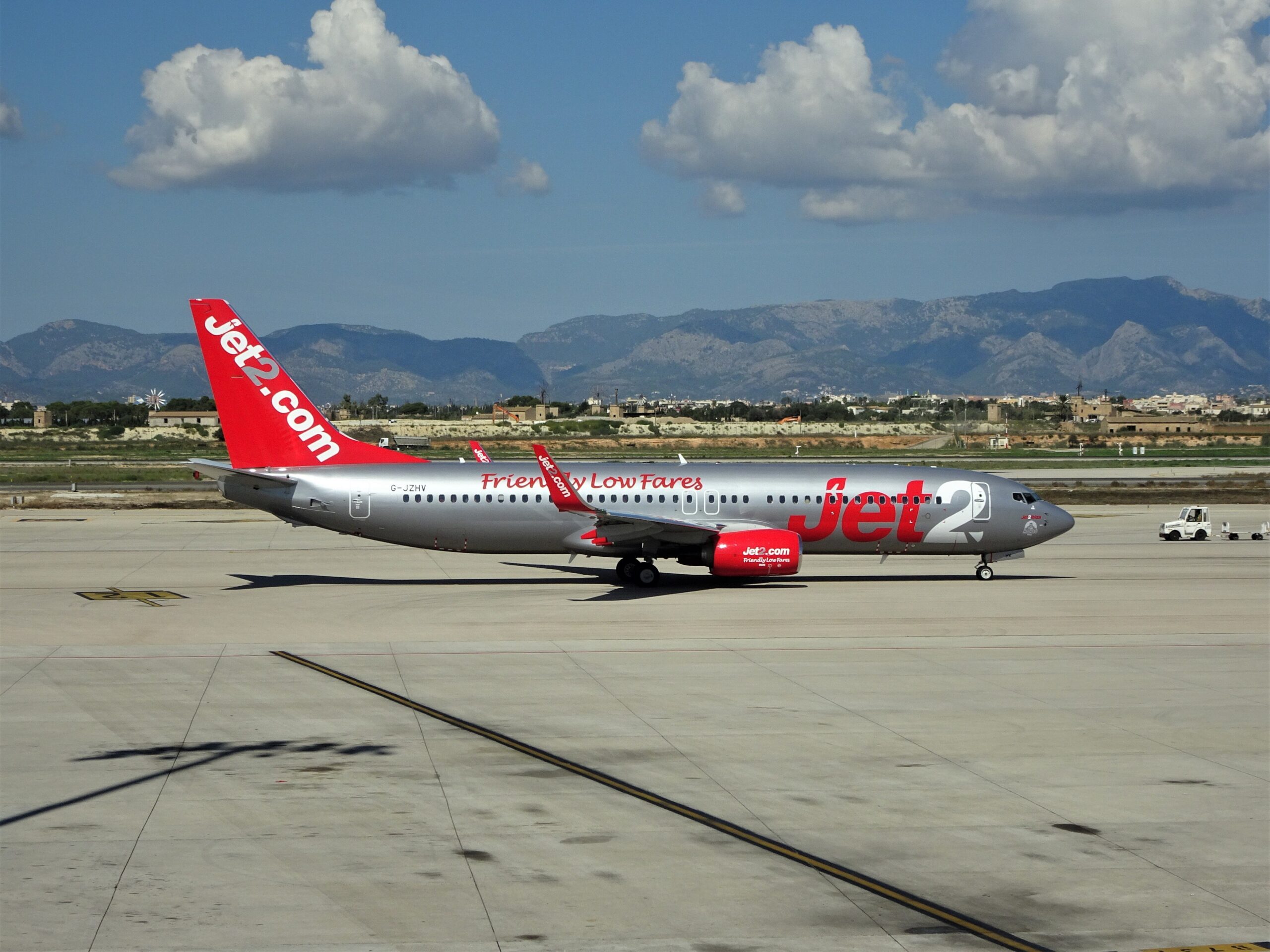 A Jet2 Boeing 737-8MG at Palma de Mallorca airport, waiting for takeoff.