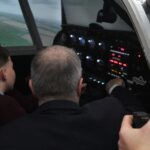 Students inside Stockton Sixth Form College's Piper Warrier cockpit simulator