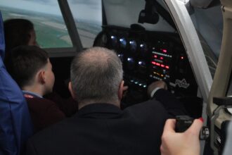 Students inside Stockton Sixth Form College's Piper Warrier cockpit simulator