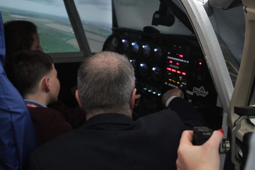 Students inside Stockton Sixth Form College's Piper Warrier cockpit simulator