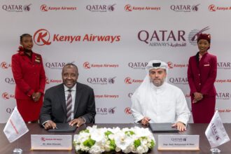 Representatives of Qatar Airways and Kenya Airways signing the Memorandum of Understanding.