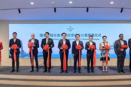 Cathay Group Chief Executive Officer Ronald Lam (fifth from left), Cathay Director Chinese Mainland Arnold Cheng (fifth from right), Cathay Director Digital and IT Lawrence Fong (fourth from left), Cathay General Manager Chinese Mainland Commercial and Operations Martin Xu (fourth from right), Cathay General Manager IT Solutions Annie Ling (third from right), Cathay General Manager IT Infrastructure and Security Rajeev Nair (second from right), Cathay General Manager Digital Ventures Navin Chellaram (third from left) and Cathay General Manager Digital Aldric Chau (second from left) marked the opening of Cathay's new Shenzhen IT office with a ribbon-cutting ceremony.