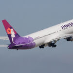 A Hawaiian Airlines flight taking off.