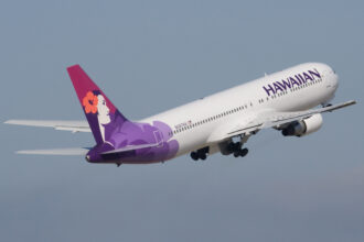 A Hawaiian Airlines flight taking off.