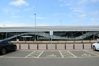Cars parked in front of the building of London Southend Airport