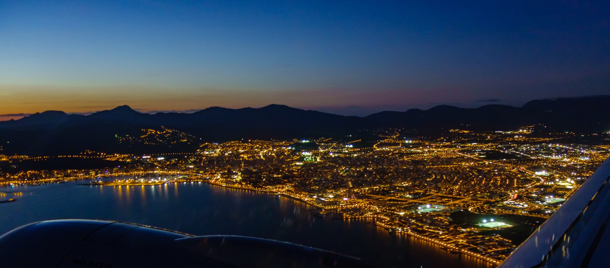 An aerial view of Palma de Mallorca, Spain, at night.