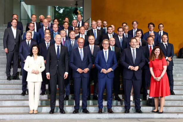 German Chancellor Friedrich Merz, Siemens CEO Roland Busch, Deutsche Bank CEO Christian Sewing and other leaders at the Federal Chancellery launching the Made for Germany initiative.