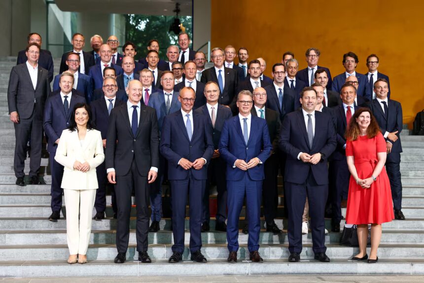 German Chancellor Friedrich Merz, Siemens CEO Roland Busch, Deutsche Bank CEO Christian Sewing and other leaders at the Federal Chancellery launching the Made for Germany initiative.