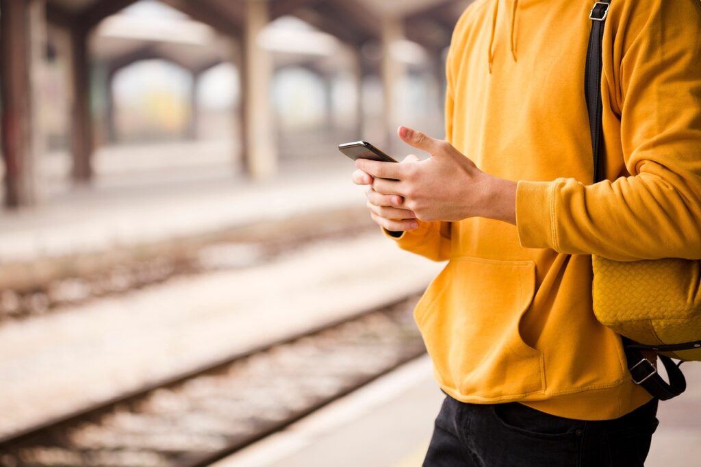 A man waiting at the train station 