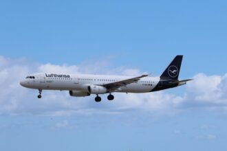 Lufthansa aircraft in the sky. Lufthansa Tecknik receives red dot awards