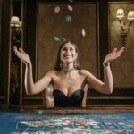 A Woman in Tube Top Tossing the Casino Chips in the Air