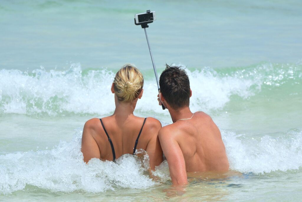 A couple with a selfie stick