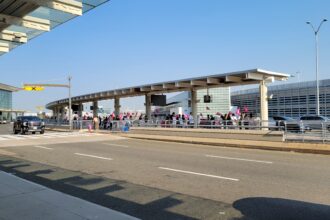 Air Canada flight attendants' picket line at Toronto Pearson International Airport terminal 1 passenger drop-off area.
