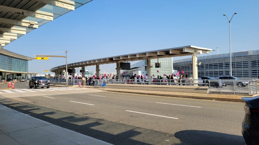 Air Canada flight attendants' picket line at Toronto Pearson International Airport terminal 1 passenger drop-off area.