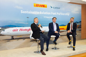 Representatives from DHL Express and Cathay Pacific Group at the deal signing event.