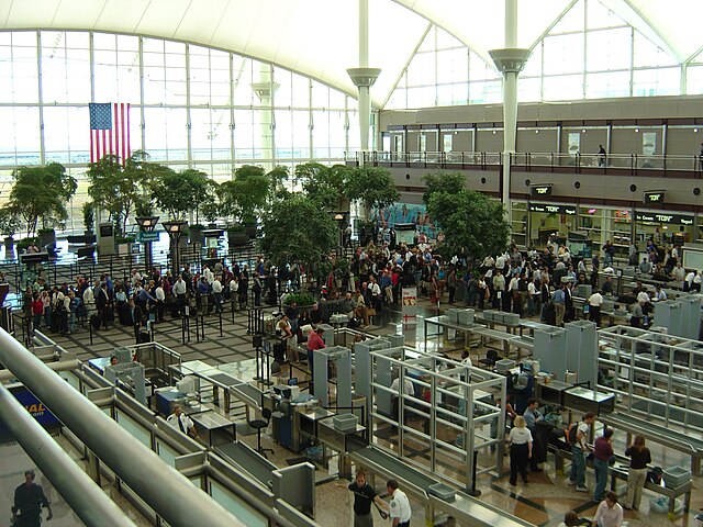 Airport security lines flooded with crowd 