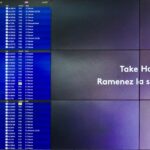 The image shows a digital departure board at an airport displaying flight information for U.S. departures. The board lists various destinations, flight numbers, gates, and statuses in both French and English. On the right side of the image, there is a partial advertisement with the text "Take Home the Taste" and "Ramenez la saveur de" in white letters on a purple background.