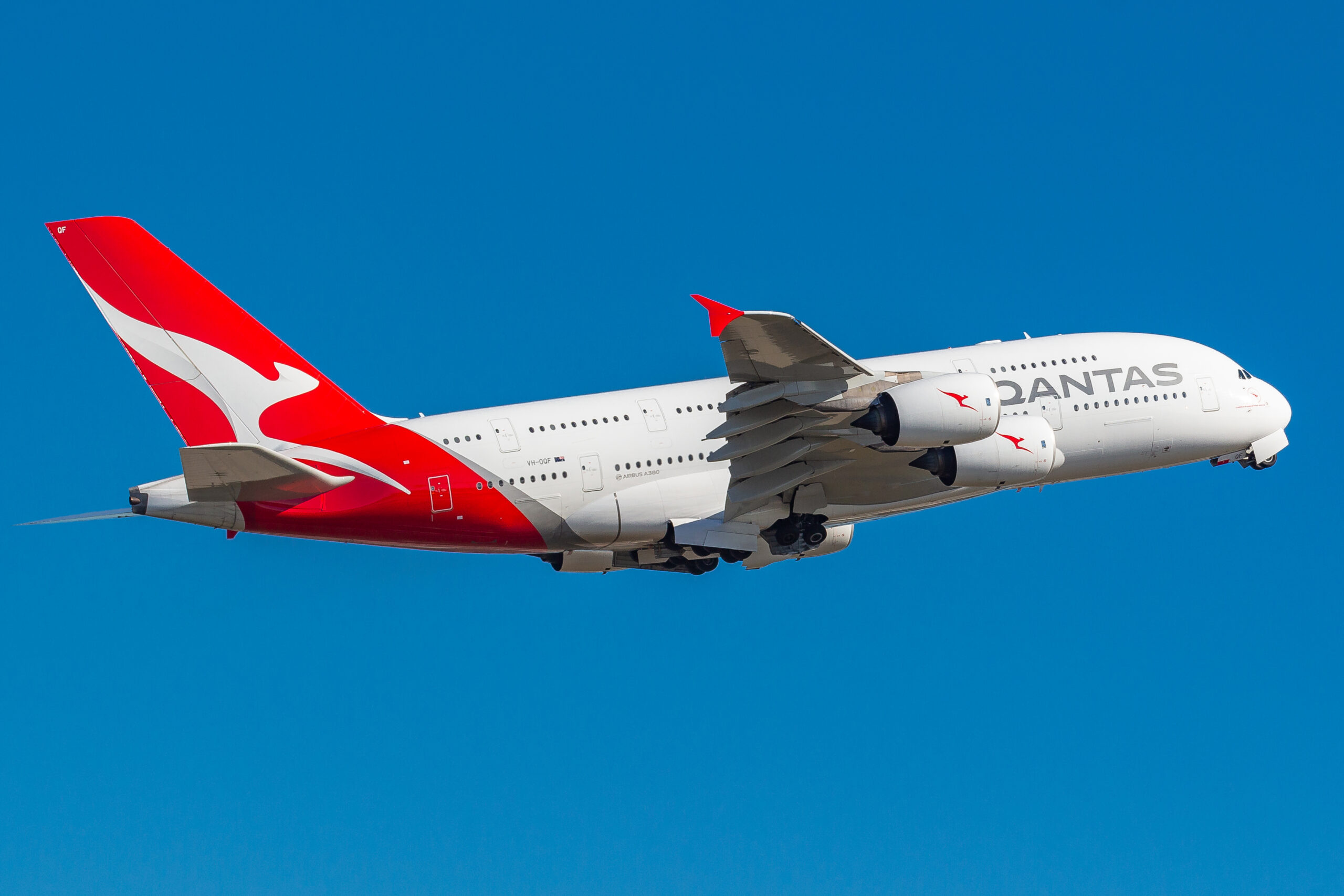 A Qantas A380 wide body aircraft in the air.