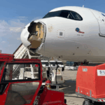 Airbus plane damage after bird strike. bird strike shortly after leaving Madrid Barajas Airport