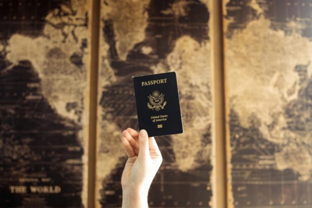Hand holding a United States passport against a vintage world map background, symbolising global mobility, aviation trends, and shifting passport rankings.