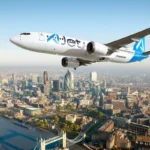 AJet Boeing 737 MAX aircraft flying over London, part of Turkish Airlines’ low-cost airline fleet expansion.