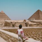 Woman Looking At Pyramids