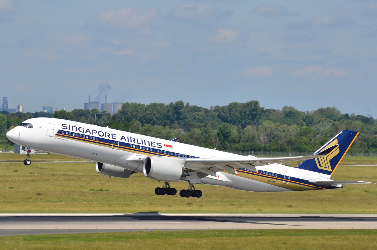 Singapore Airlines Airbus A350 gracefully lifting off, showcasing advanced aerodynamics and modern design
